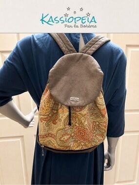 KASSIOPEIA 
Par la Bohème Convertible Backpack with Interchangeable Pocket .